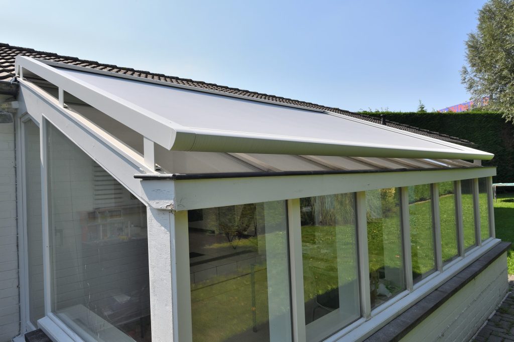 Toldo veranda Brustor B128 06 Toldo veranda Brustor B128 sobre techo acristalado